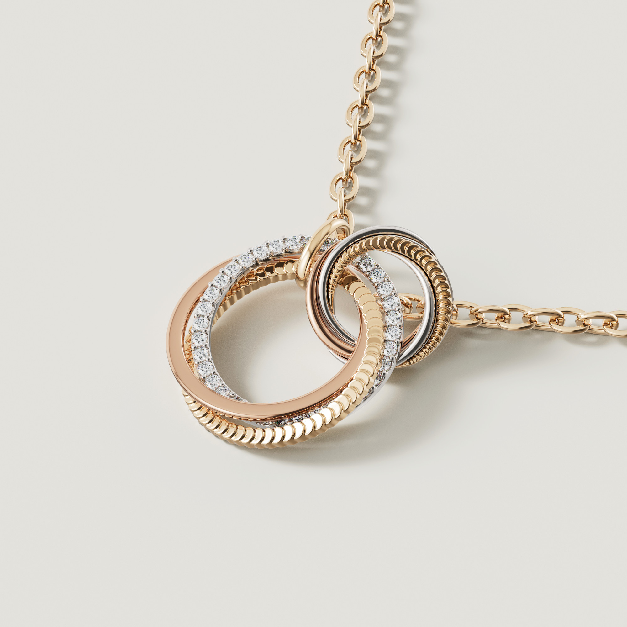 Trio Diamond Pendant
In 18K Yellow Rose & White Gold
